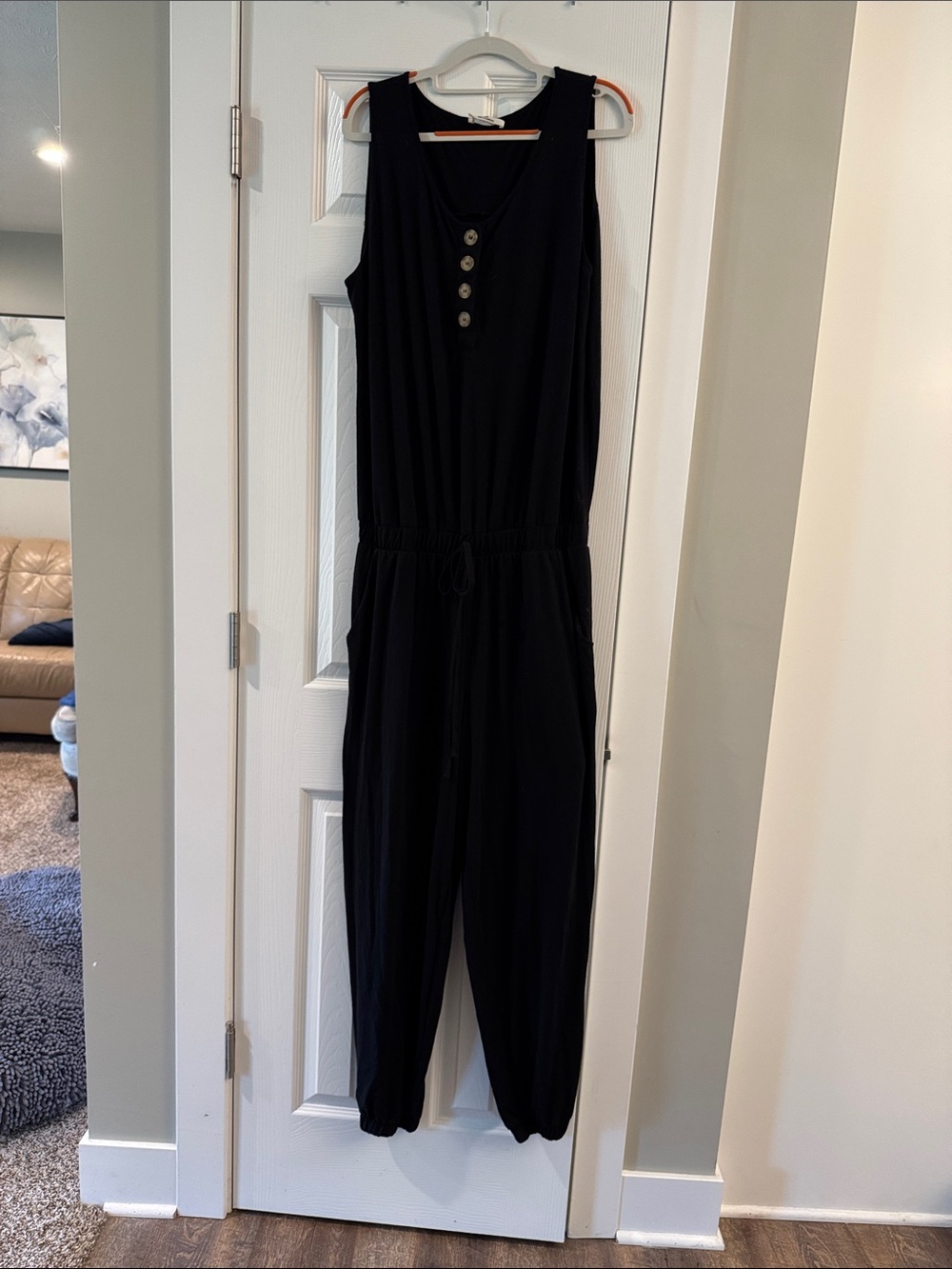 Zenana Sleeveless Black Henley Jumpsuit with Elastic Waist and jogger bottom